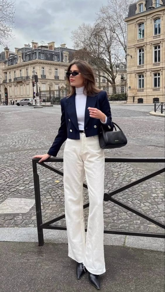 Navy cropped blazer over a white turtleneck